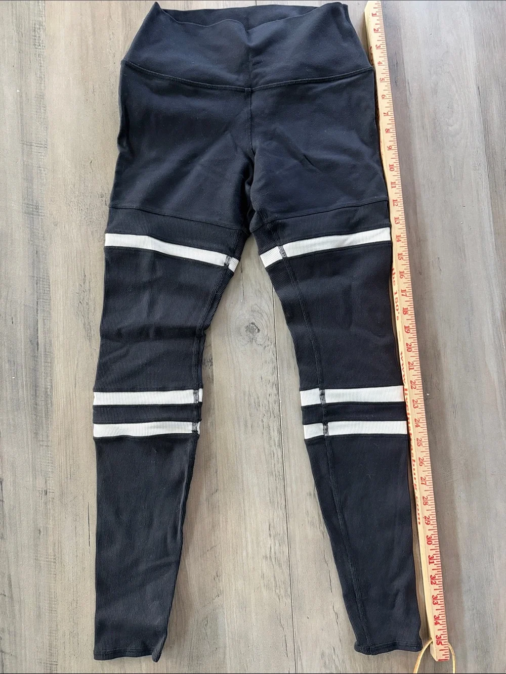 Alo Medium Ribbed Black Leggings with White Striped Knee Details - Picture 3 of 11